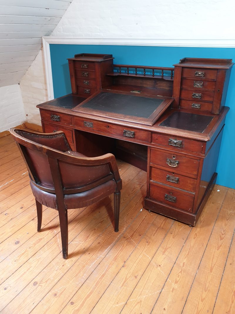 Mahogany writing store desk with drawers